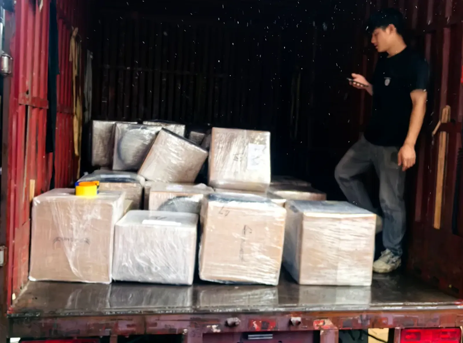 Brake parts cartons loaded into an export container