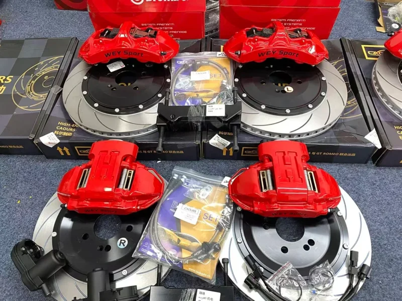 Custom brake caliper kit with GT6 six piston front calipers and rotors