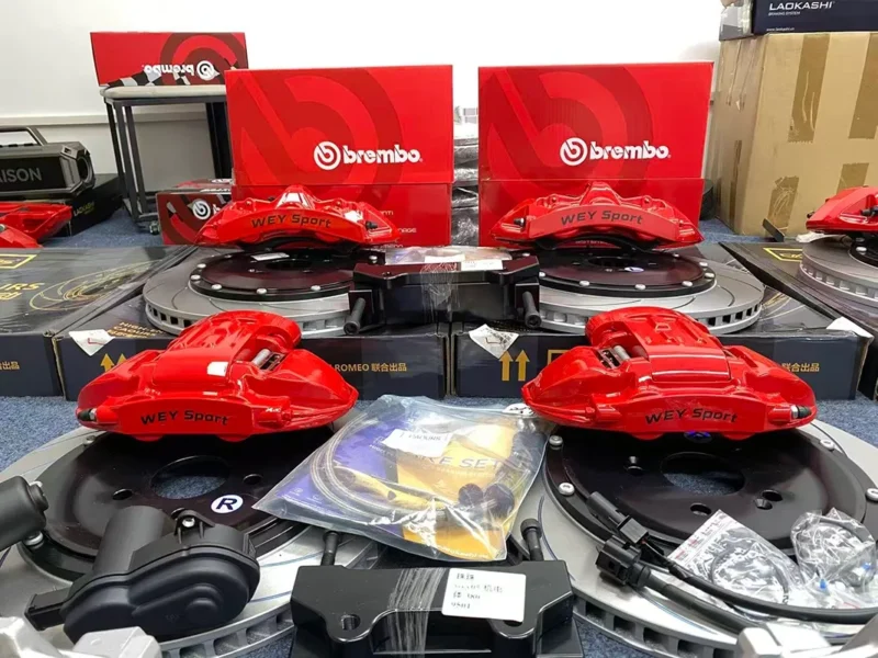 Custom brake caliper kit with GT6 six piston front calipers and rotors