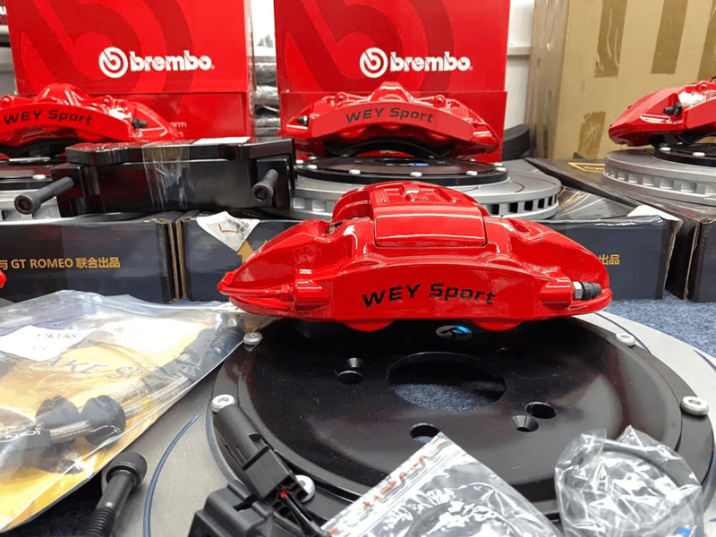 Integrated EPB rear brake caliper kit with electronic parking brake actuator