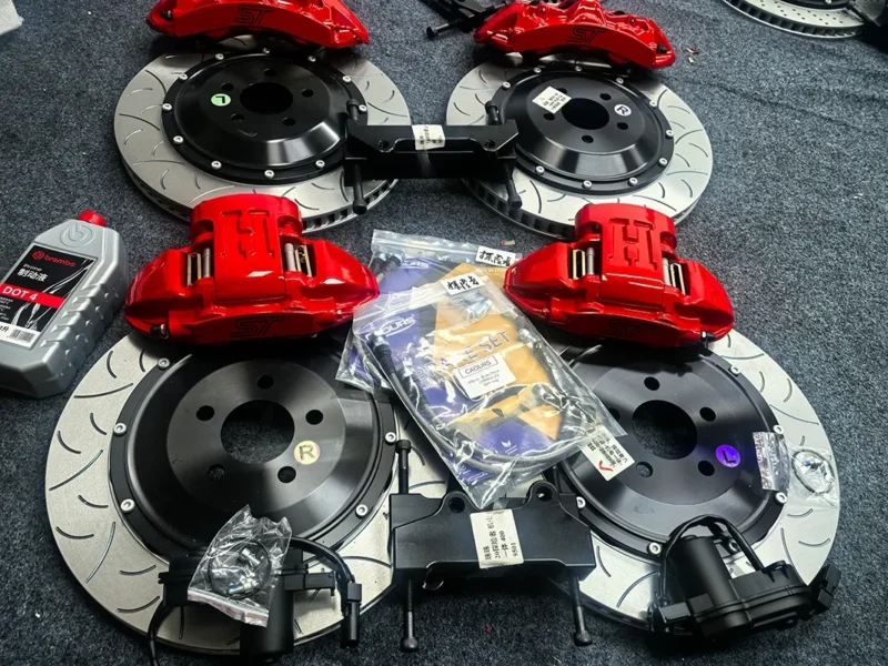 Integrated EPB rear brake caliper kit with electronic parking brake actuator