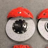 BMW X1 F49 Akebono 10N front brake kit 412/420 mm — Akebono 10N front caliper and drilled rotor shown behind an alloy wheel for BMW X1 F49 clearance review