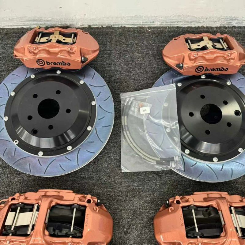 Rear brake disc with integrated drum-in-hat parking brake drum inside the hub for cable-operated parking brake shoes.