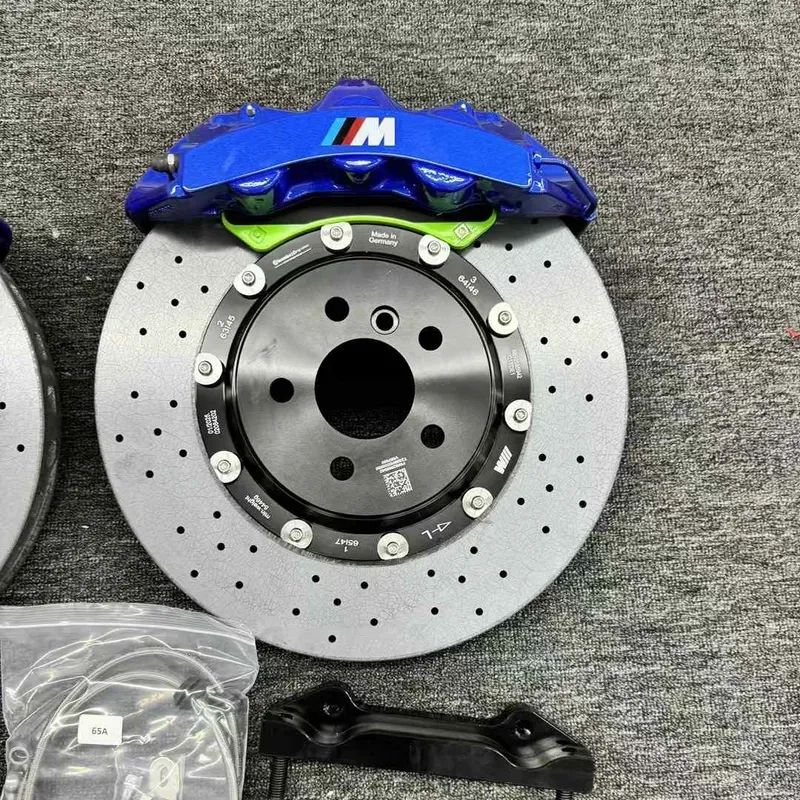 BMW F30 GT6 brake calipers and rotors arranged for front kit configuration review