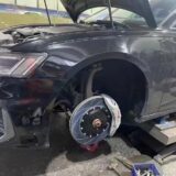 BMW X3 G01 front brake caliper kit installation guide with rotor, bracket and wheel-clearance checks